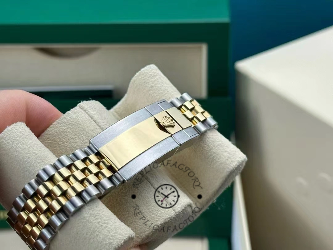 Rolex GMT Master II Black Dial Steel 18kt Yellow Gold 126713GRNR