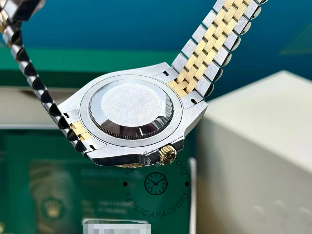 Rolex GMT Master II Black Dial Steel 18kt Yellow Gold 126713GRNR