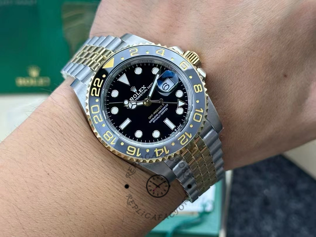 Rolex GMT Master II Black Dial Steel 18kt Yellow Gold 126713GRNR