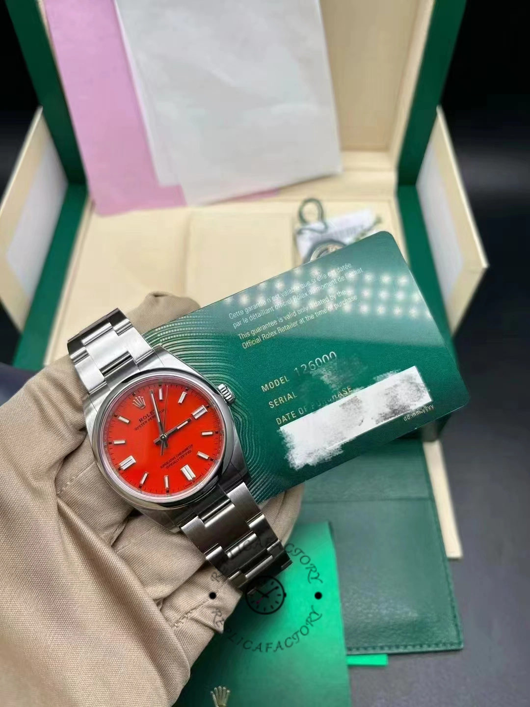 Rolex Oyster Perpetual Coral Red Dial Oyster Bracelet 126000 0007