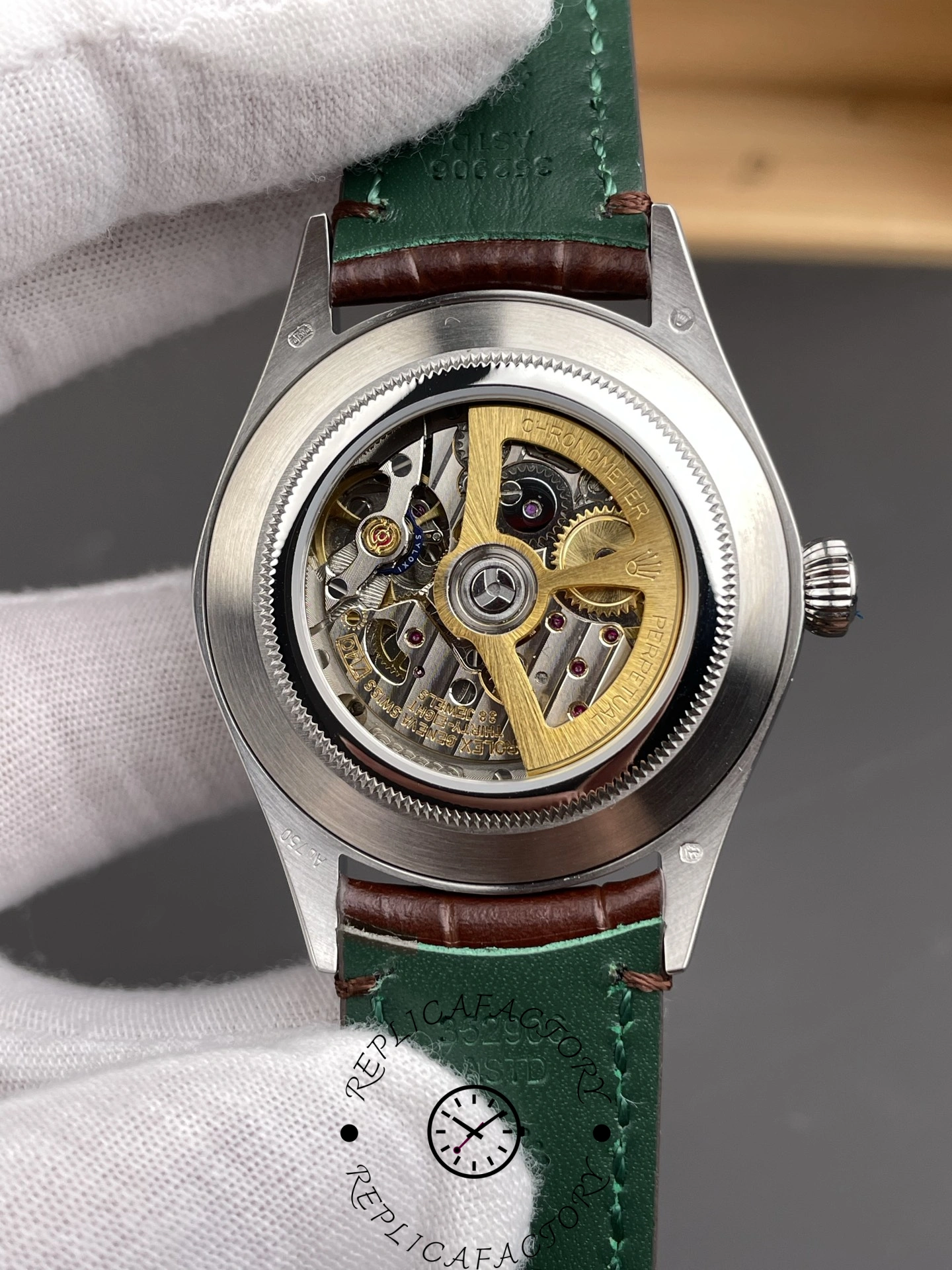Caseback of Rolex 1908 52506 showing transparent back and movement details.