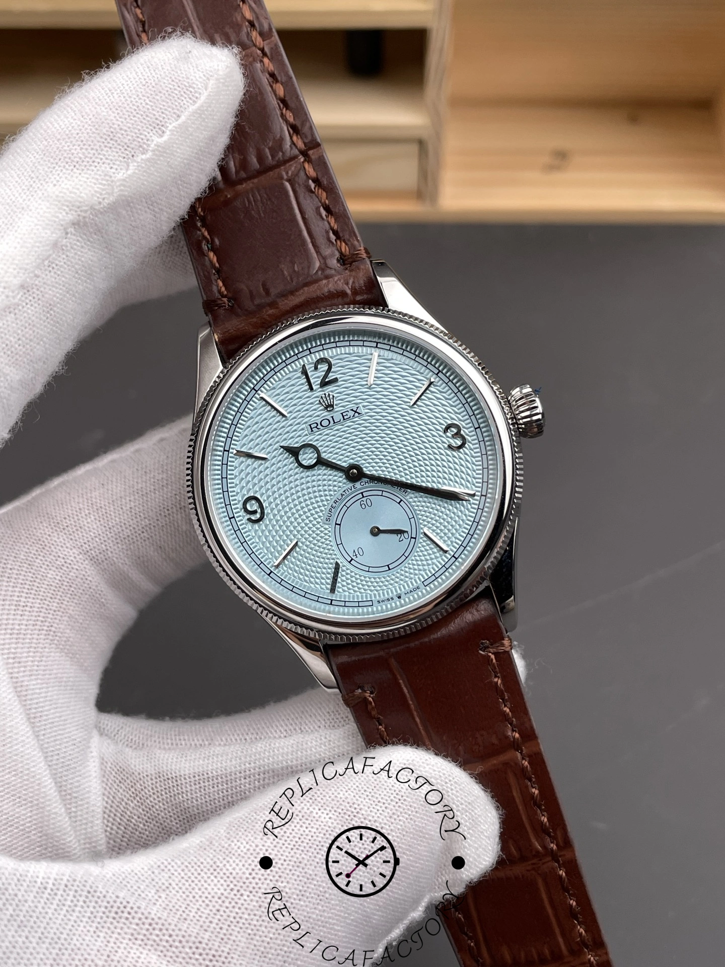 Straight-on view of Rolex 1908 52506 showing elegant ice blue dial with platinum case.