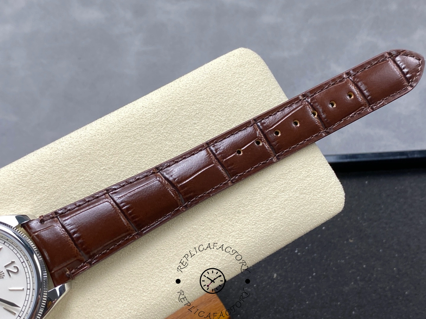 Close-up of Rolex Perpetual 1908 52509-0006 brown alligator leather strap.