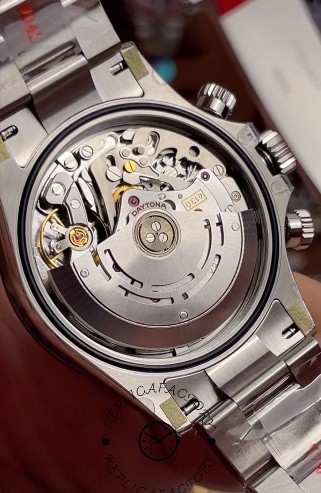 Open caseback view showing Rolex Caliber 4130 movement inside Daytona 116500LN-0001.