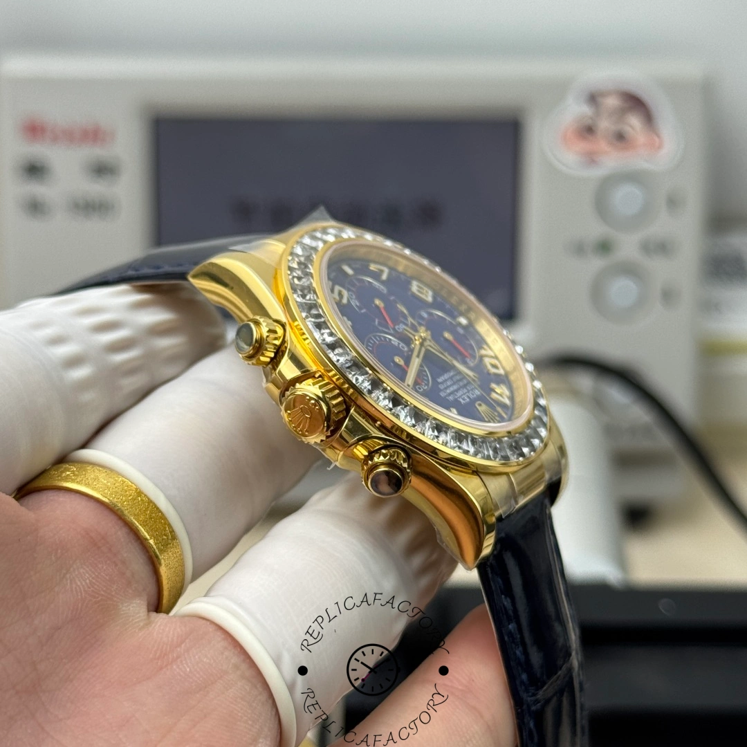 Right side view of Rolex Daytona 116518 showing gold crown and pushers.