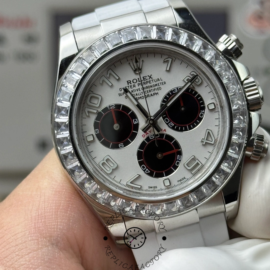 Close-up of Rolex Daytona 116519 white dial and polished steel case.