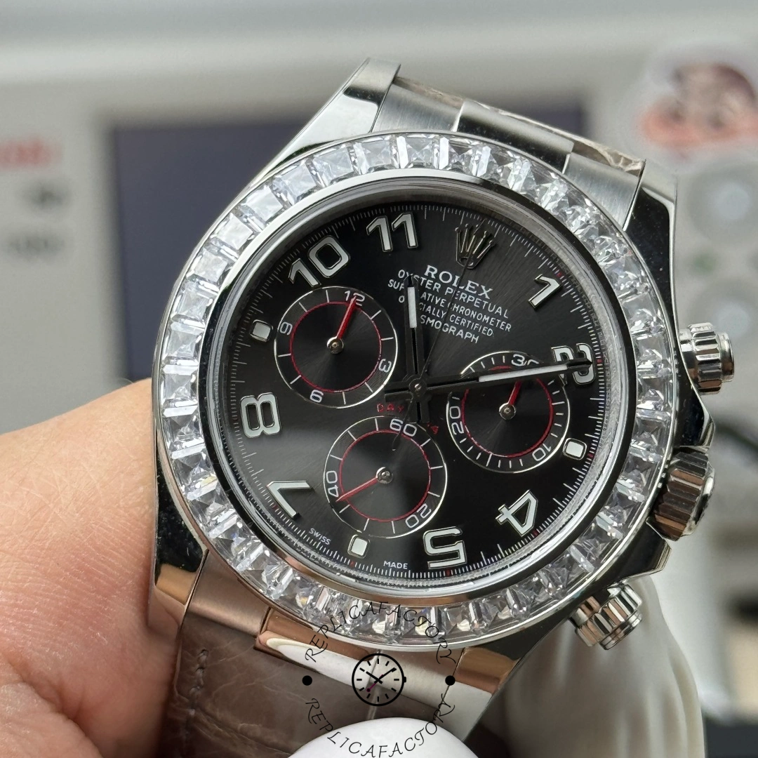 Detailed macro of Rolex Daytona 116509 showing Arabic numerals and polished hands.