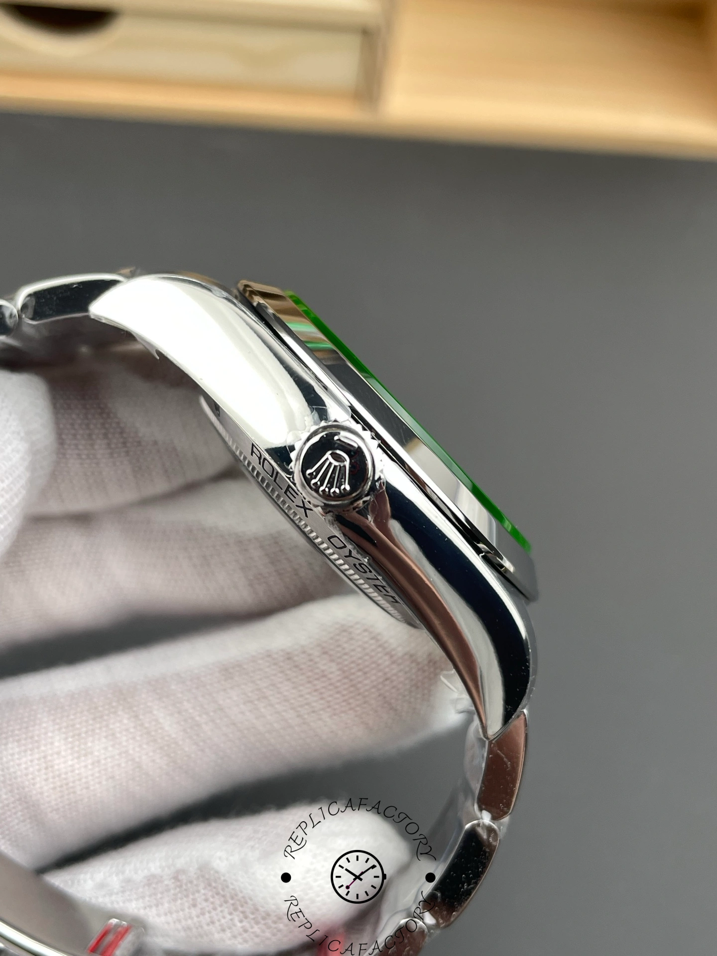 Crown side of Rolex Milgauss 116400GV showing Rolex logo engraved on winding crown.