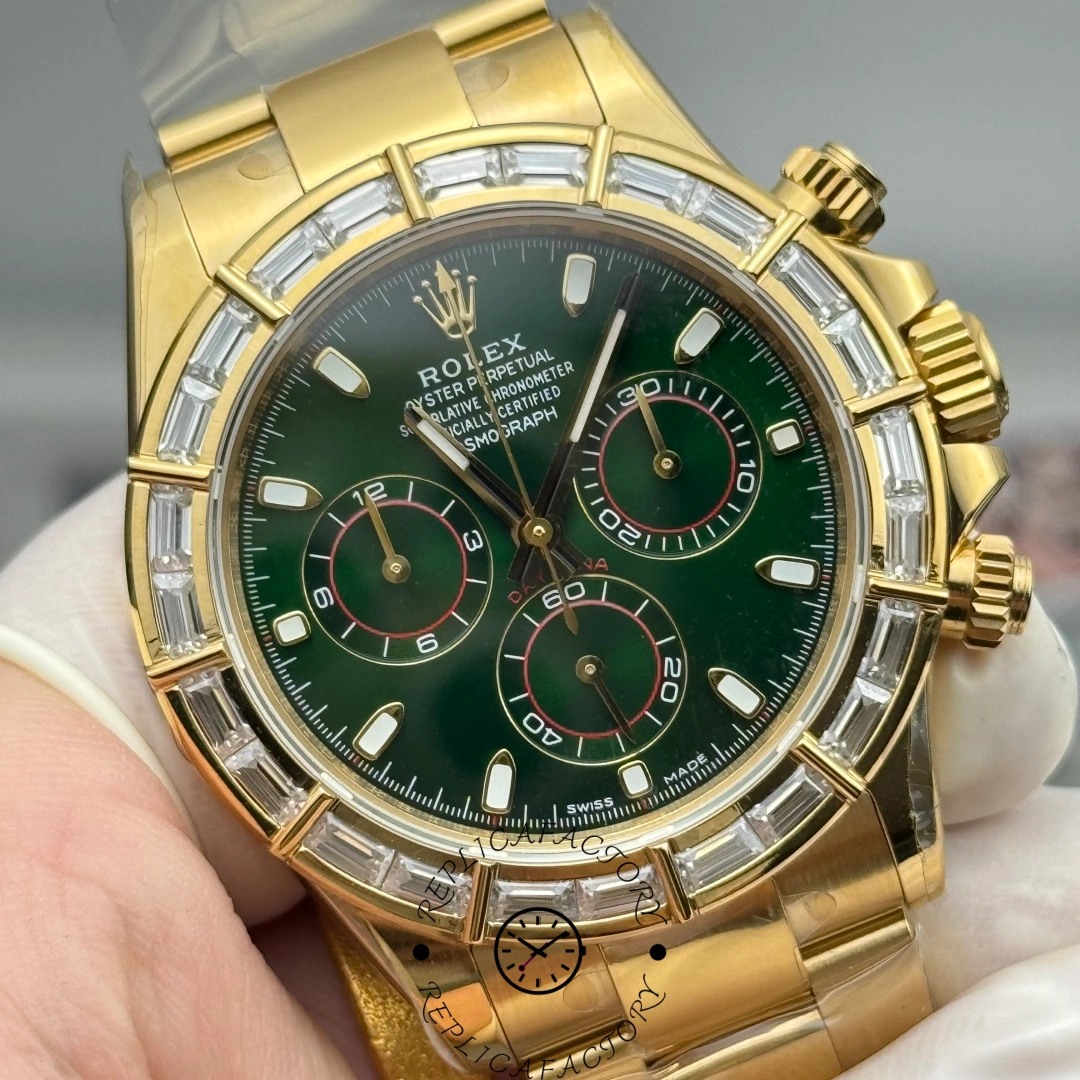 Close-up of Rolex Daytona 116568BR showing gold hands and green dial with red accents.