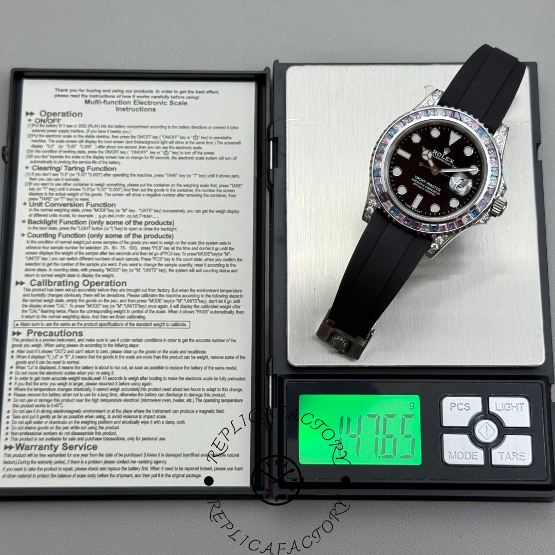 Rolex Yacht-Master 126679SABR-0002 placed on digital scale showing total weight of 147.85 grams.