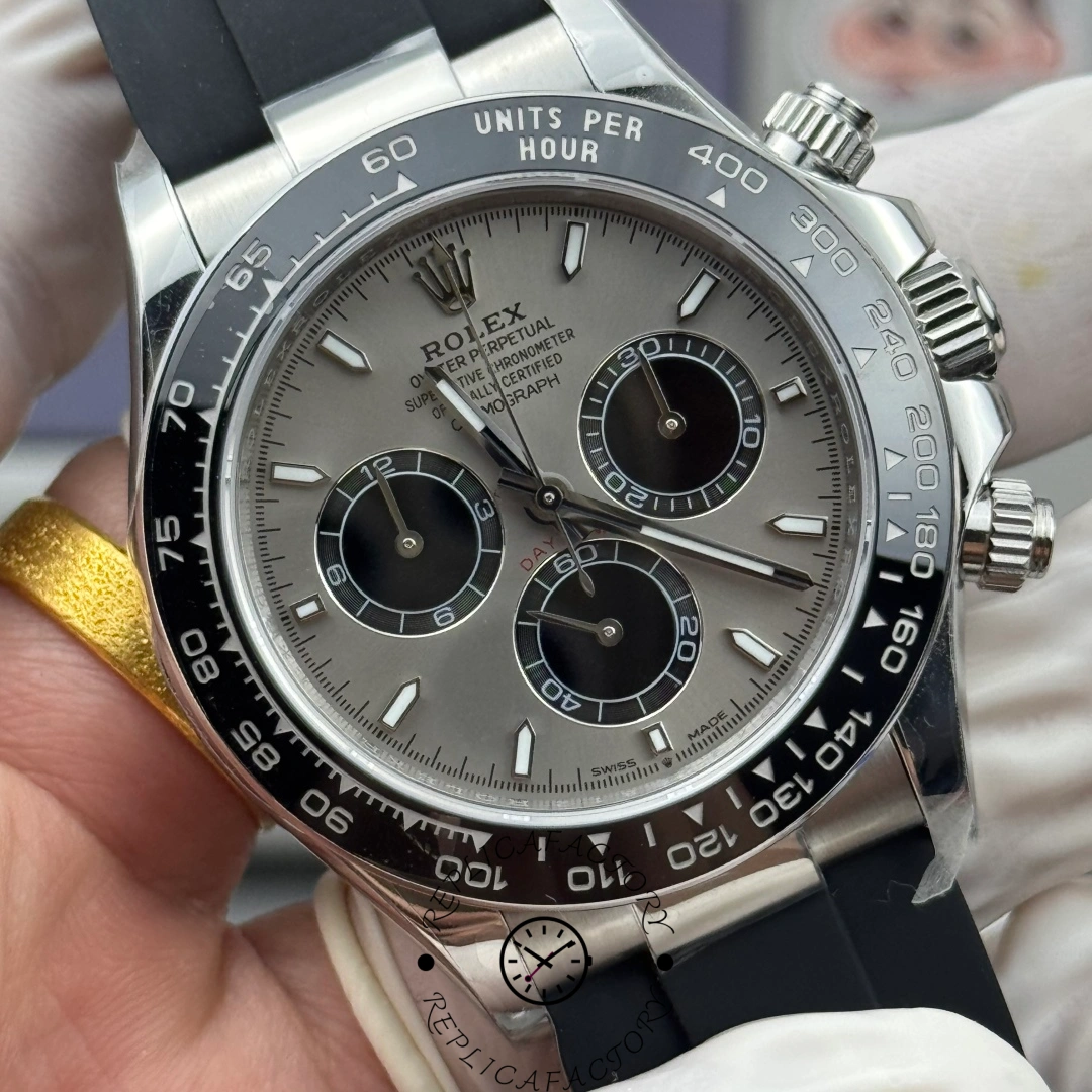 Macro view of the Rolex Cosmograph Daytona 126519LN-0006 highlighting the black ceramic tachymeter bezel and crown guards.