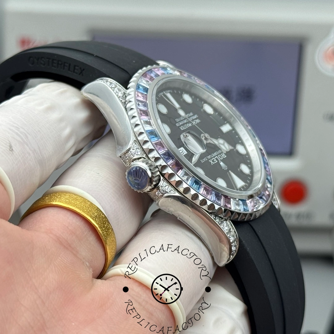 Side profile of the Rolex Yacht-Master 126679SABR-0002 showing the blue cabochon crown and Oysterflex strap.