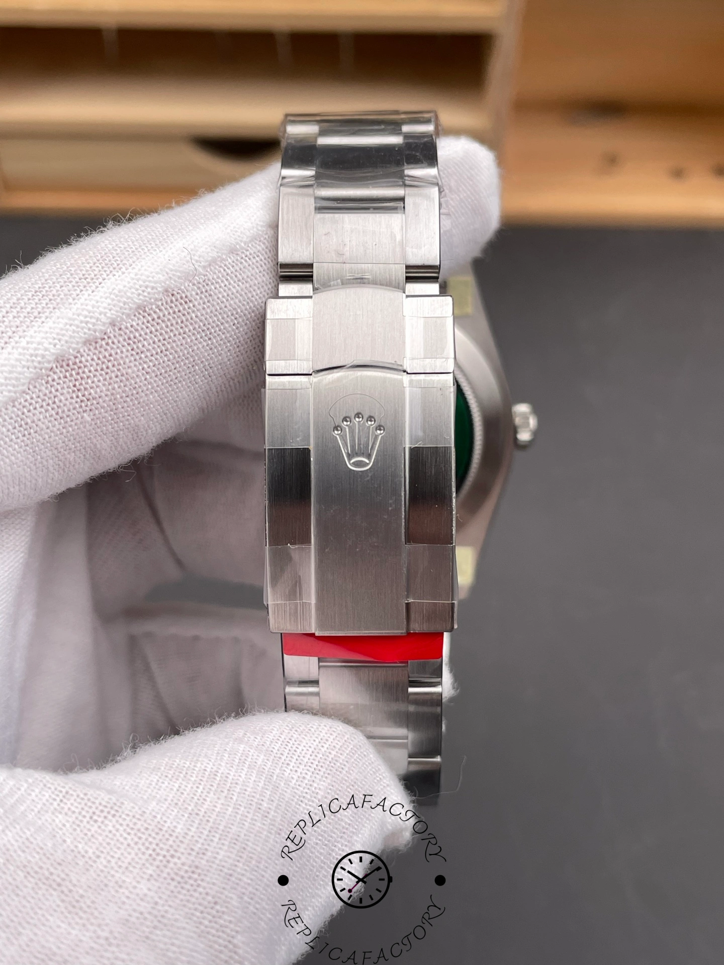 Close-up of the Rolex Oyster Perpetual 41 clasp showing the Oyster bracelet and Rolex crown logo.