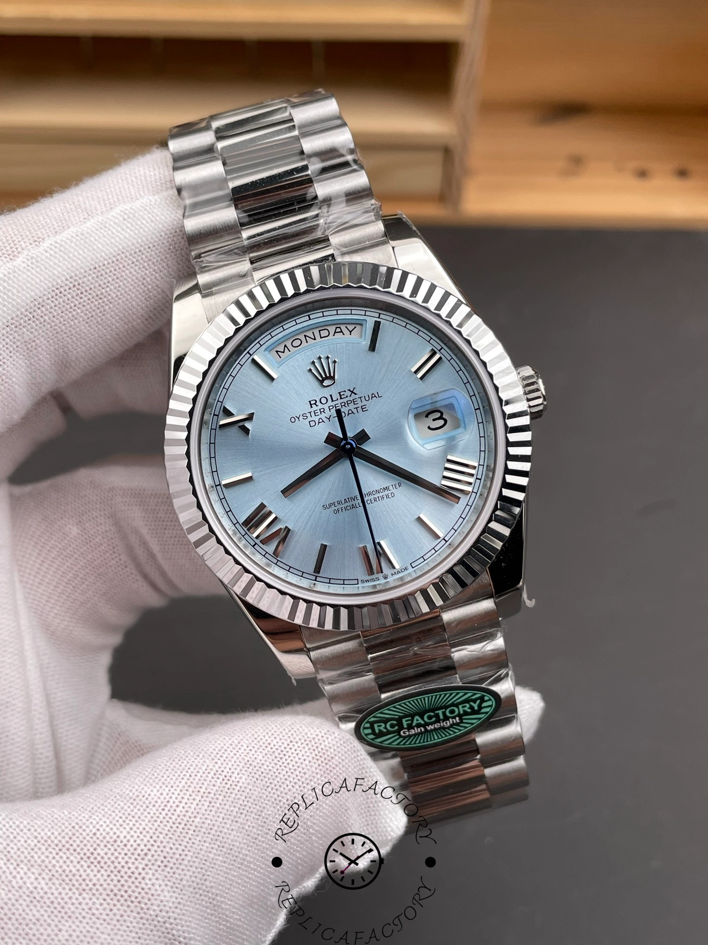 Rolex Day-Date 228236 40mm Ice Blue Dial close-up showing Roman numerals