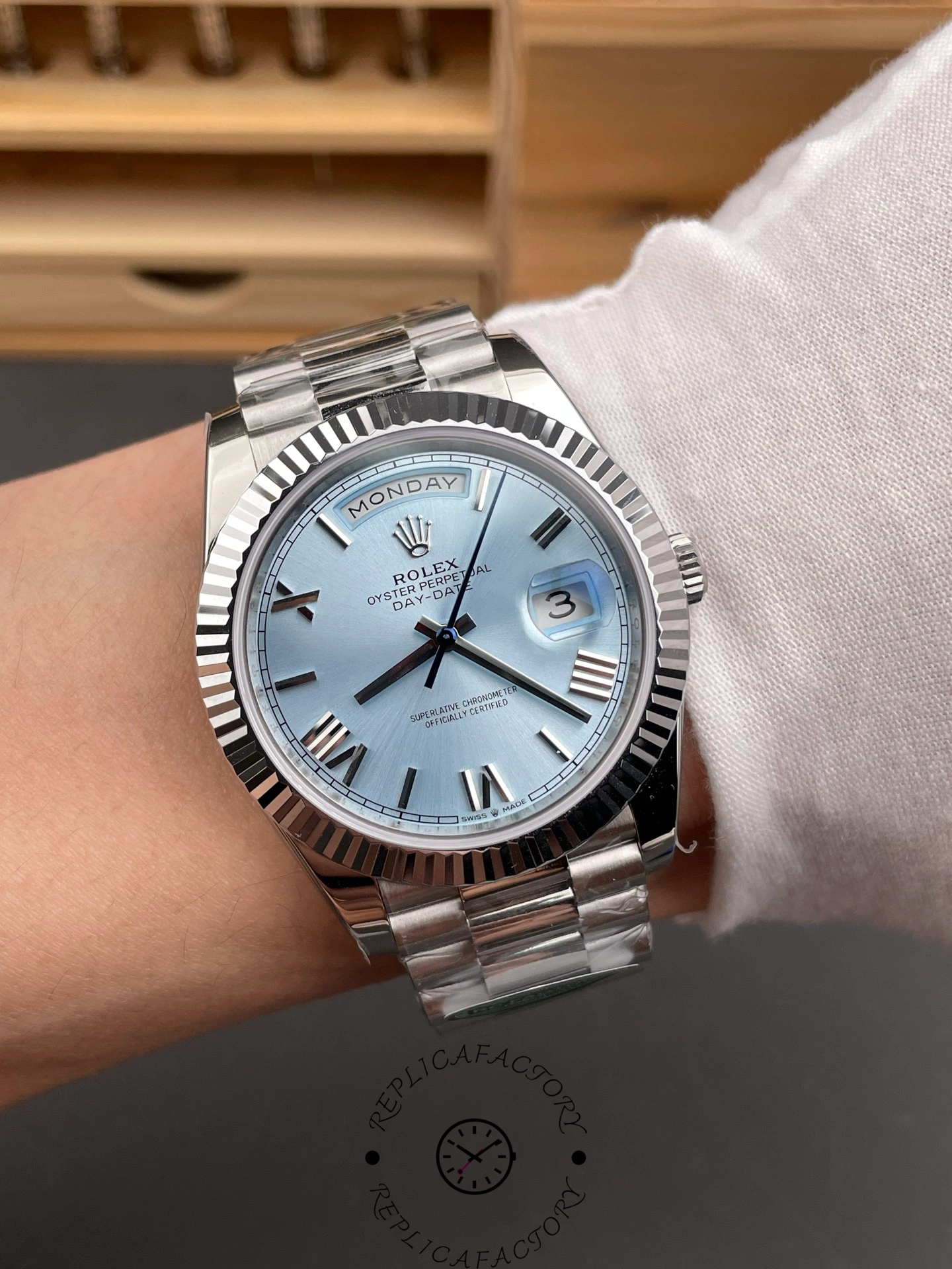 Rolex Day-Date 228236 on wrist display, ice blue dial with day-date window
