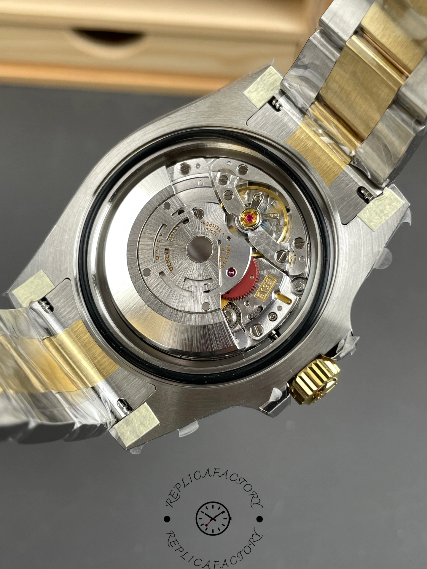 Back view of the Rolex Submariner 116613LB displaying the visible automatic movement.