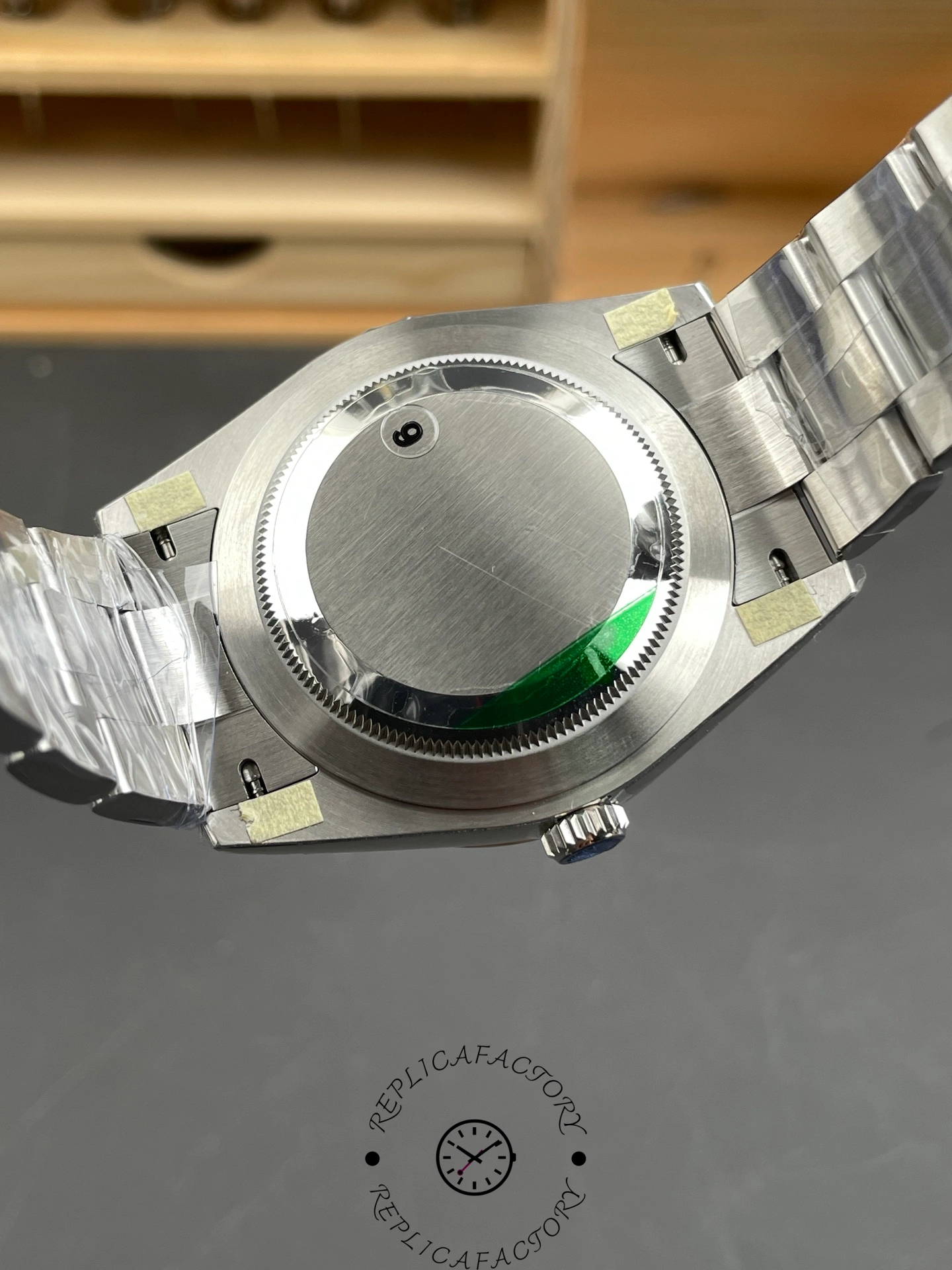 Caseback detail of the Rolex Oyster Perpetual 41 featuring the brushed stainless steel back cover.