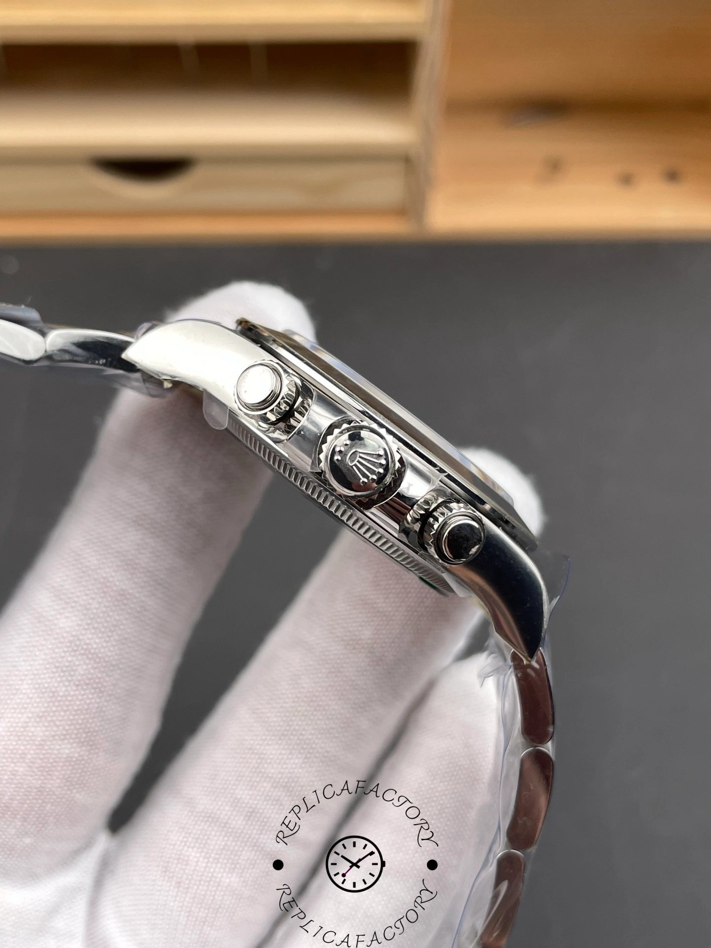 Side view of the Rolex Daytona 126509-0001 showing the screw-down crown and chronograph pushers.