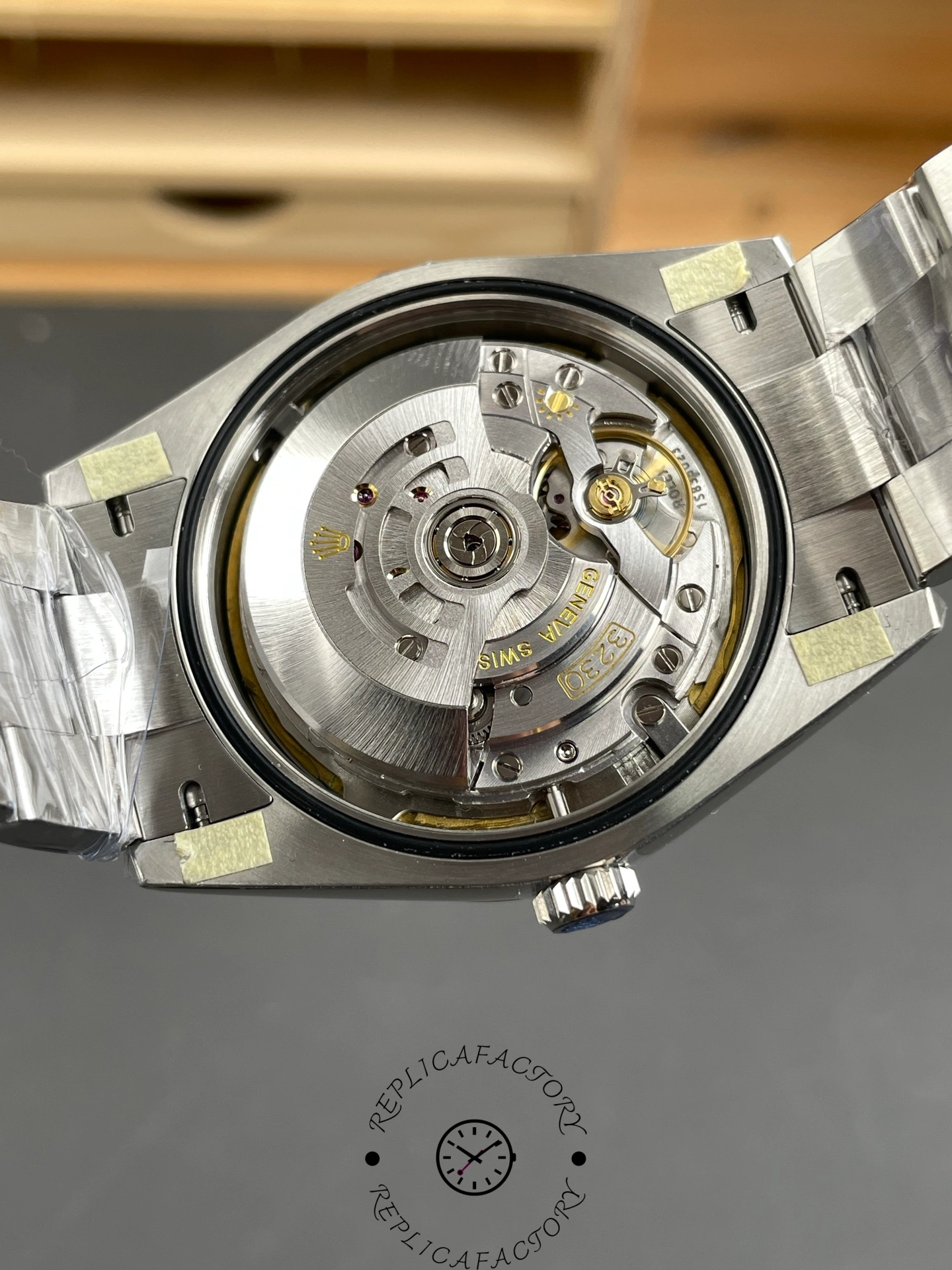 Exhibition caseback view of the Rolex Oyster Perpetual 41 revealing the automatic movement and rotor.