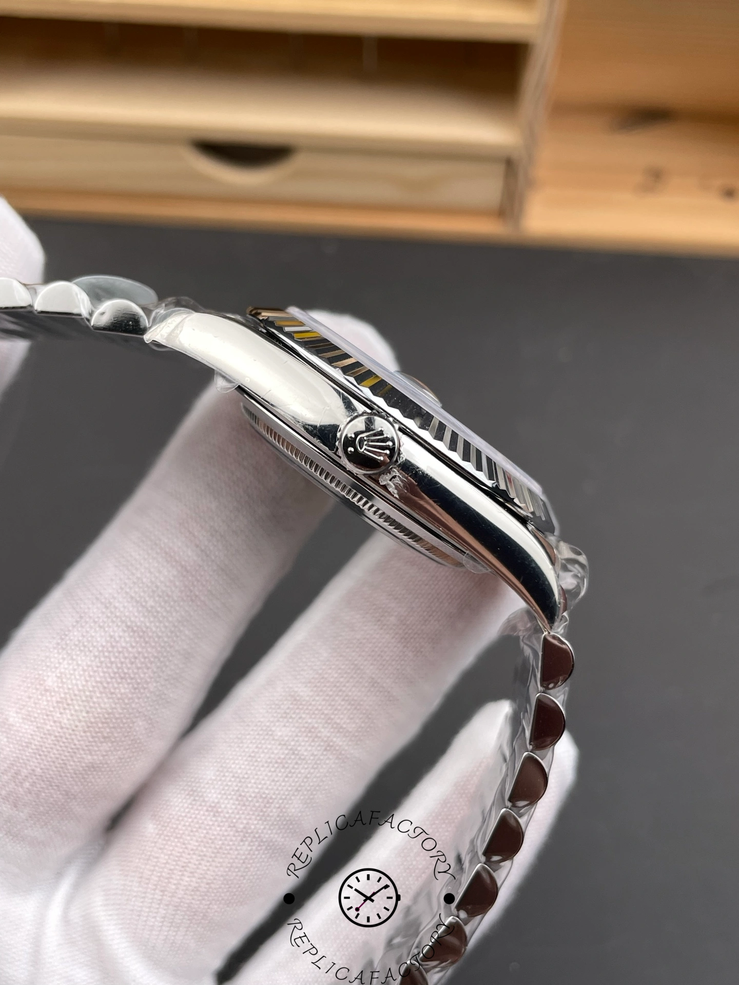 Rolex Day-Date 228236 side profile view showing crown and bezel details