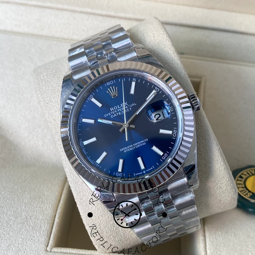 Angled view of the Rolex Datejust 126334-0002 showing the blue sunray dial, Cyclops date window, and Jubilee bracelet.