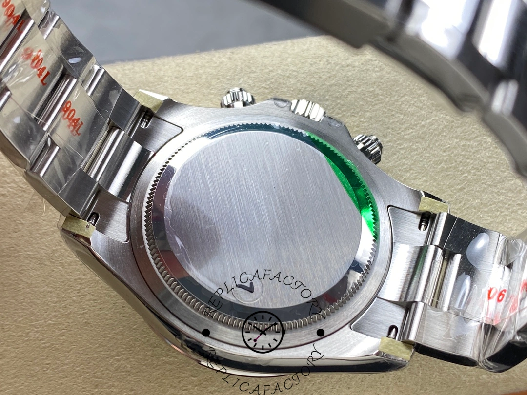 Caseback of the Rolex Cosmograph Daytona 116500LN showing the brushed stainless steel finish and green protective seal.
