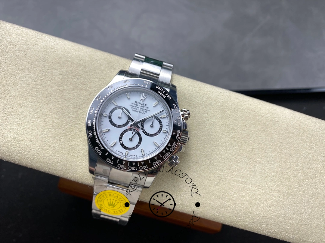 Full display of Rolex Cosmograph Daytona 116500LN on beige cushion showing entire watch front and bracelet.