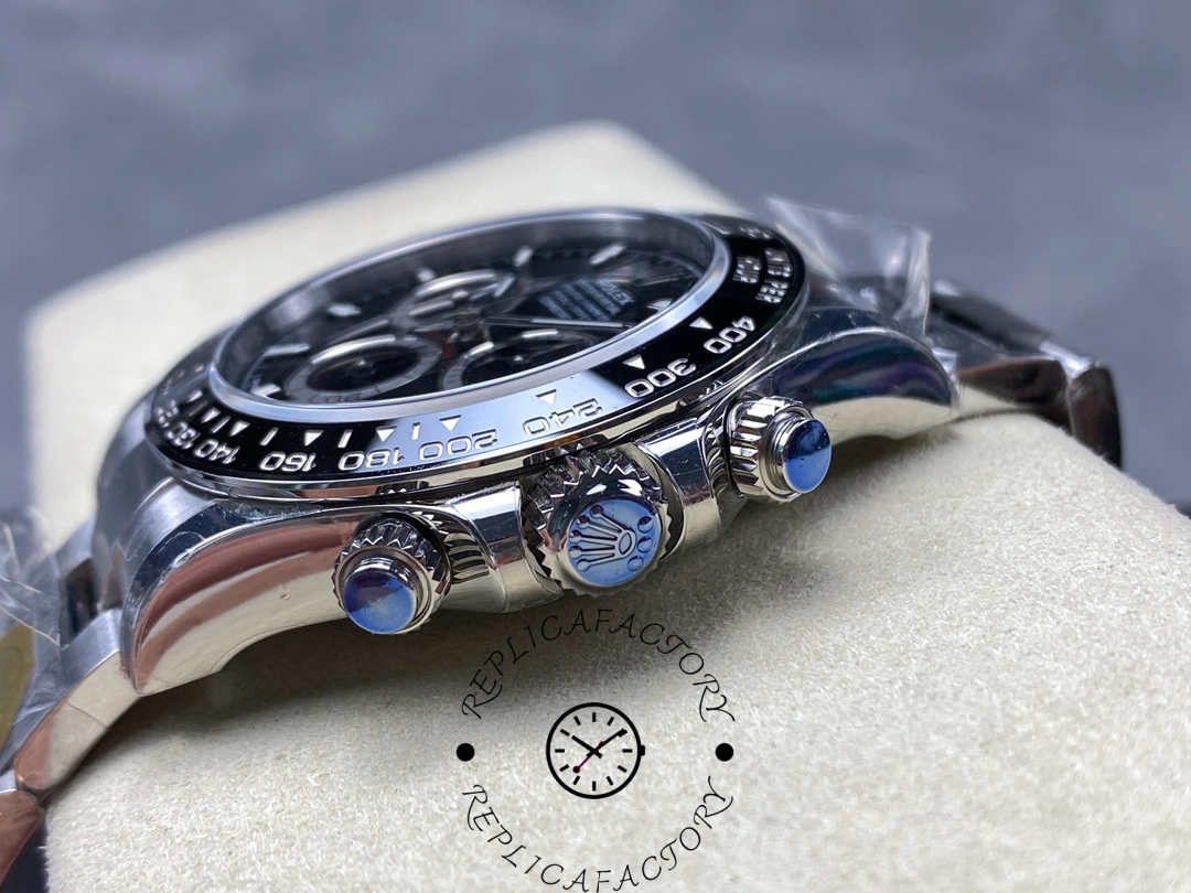 Detailed view of the Rolex Cosmograph Daytona 116500LN showing the screw-down pushers and Rolex crown logo on the winding crown.