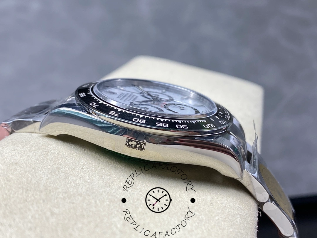 Opposite side view of Rolex Cosmograph Daytona 116500LN case showing polished finish and laser-etched hallmarks.