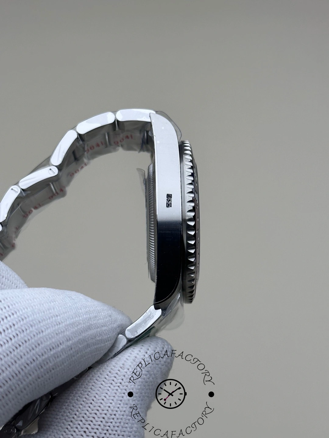 Left profile view showing brushed case and the meteorite dial thickness of Rolex GMT-Master II 126719BLRO-0002.