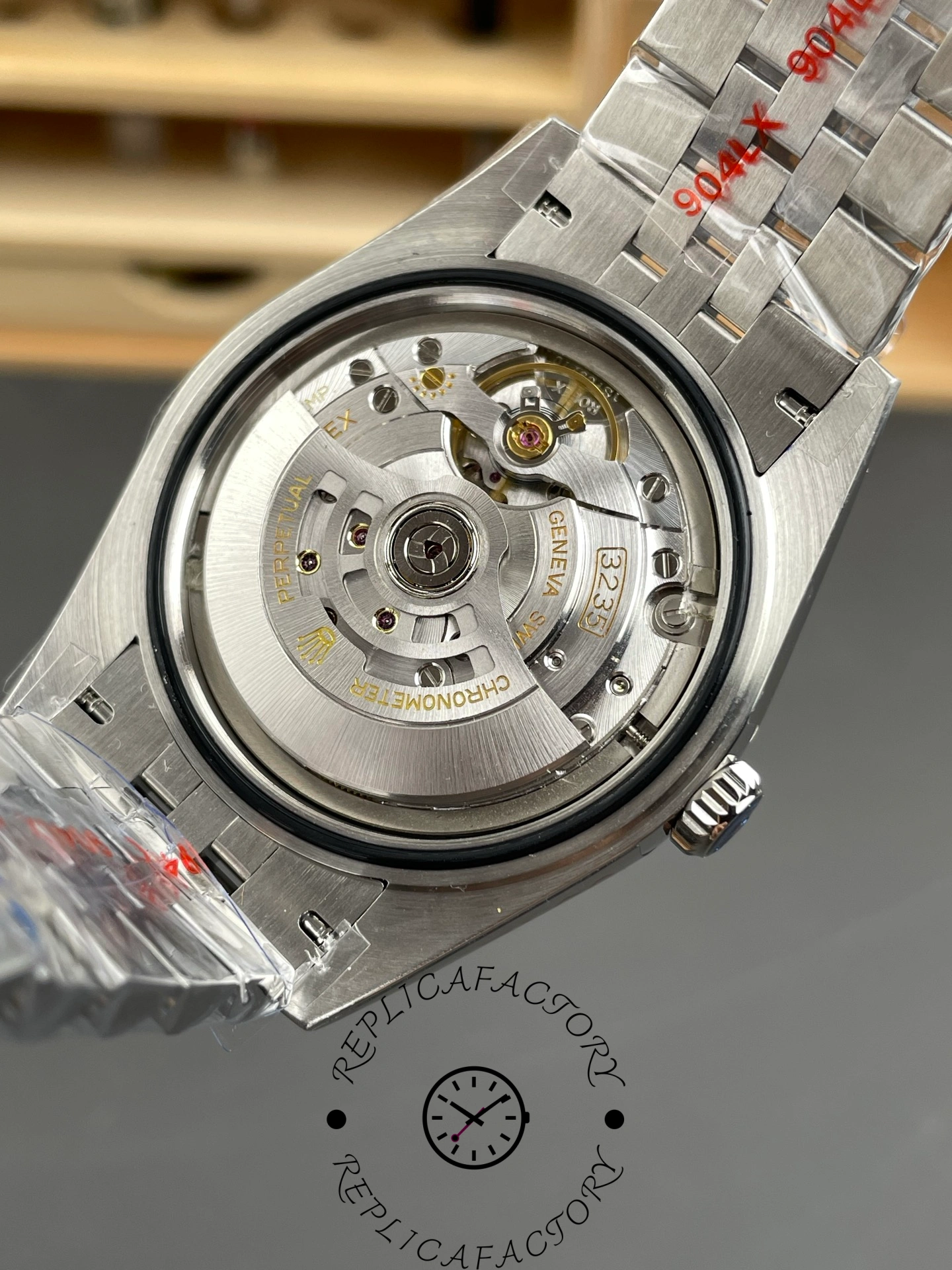 Open caseback view of the Rolex Datejust 126334-0018 revealing 3235 automatic movement rotor and Geneva engravings.