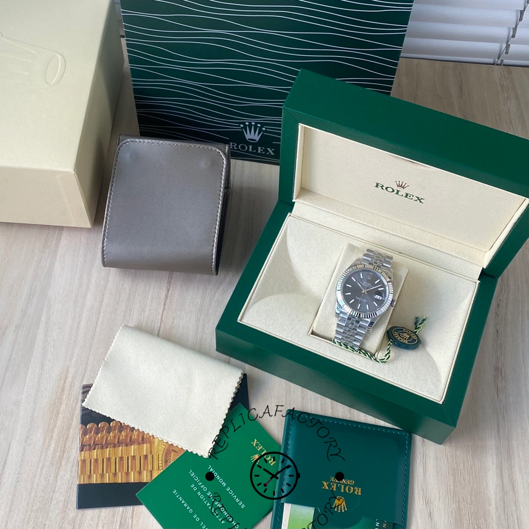 Full Rolex Datejust 126334-0014 replica set with box, card, manual, and cleaning cloth.