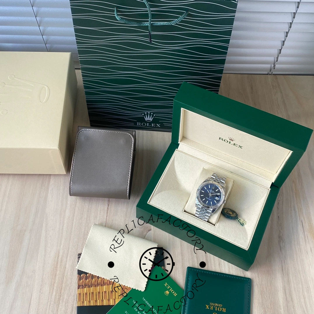 Complete set view of the Rolex Datejust 126334-0002 with original box, papers, and accessories.