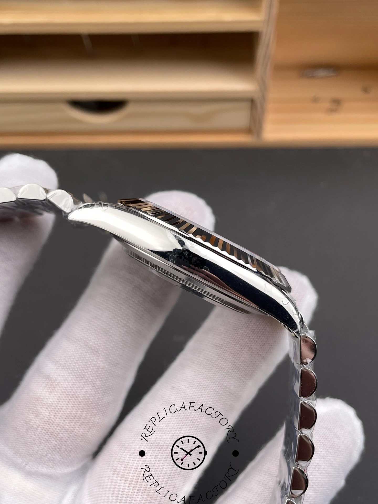 Opposite side view of THB Factory Rolex Datejust 41 ref. 126334-0026 showing polished lugs and bezel curvature.