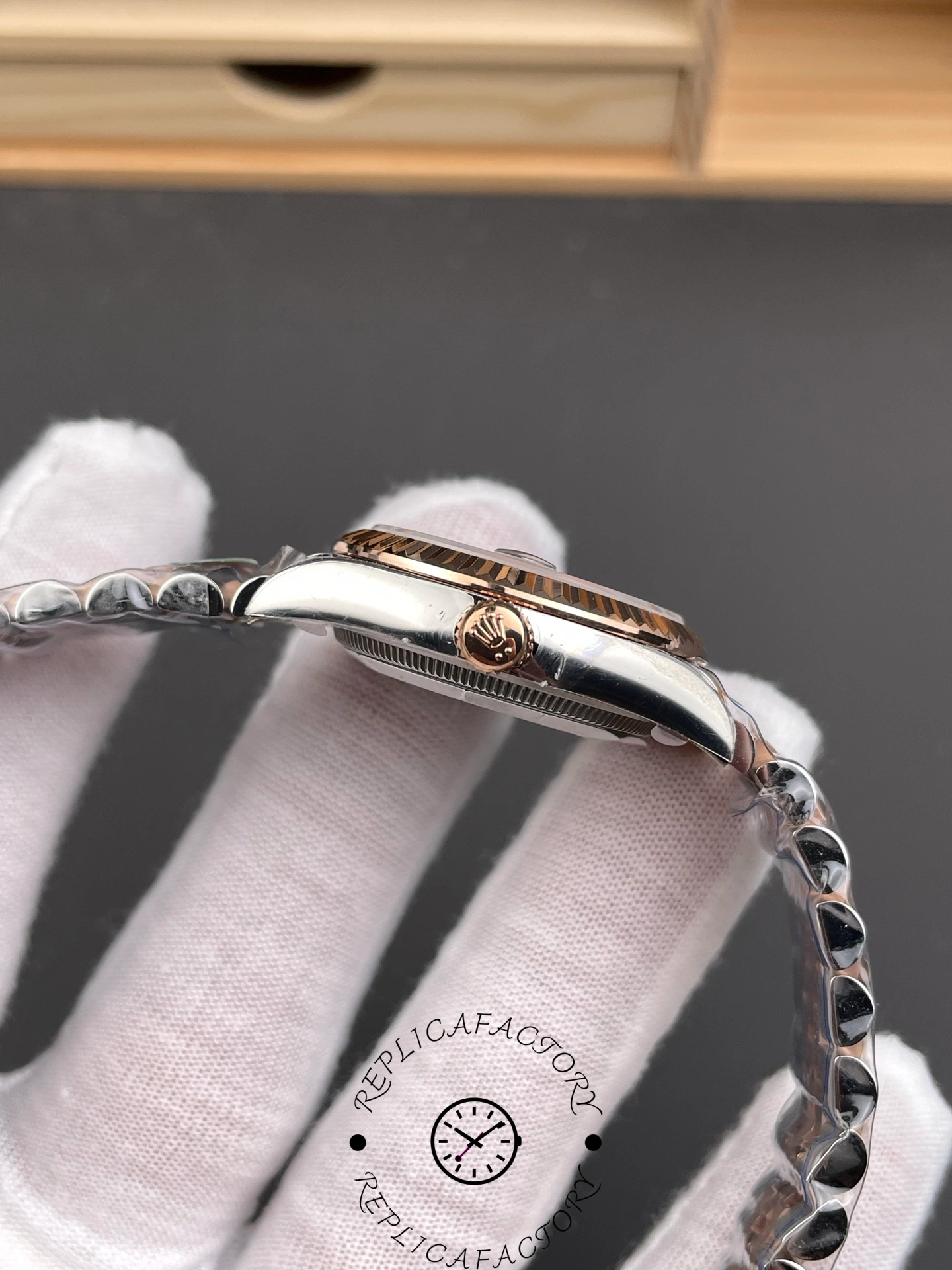 Side view of THB Factory Rolex Datejust 31 ref. 278271-0028 showing Everose gold screw-down crown with Rolex logo.