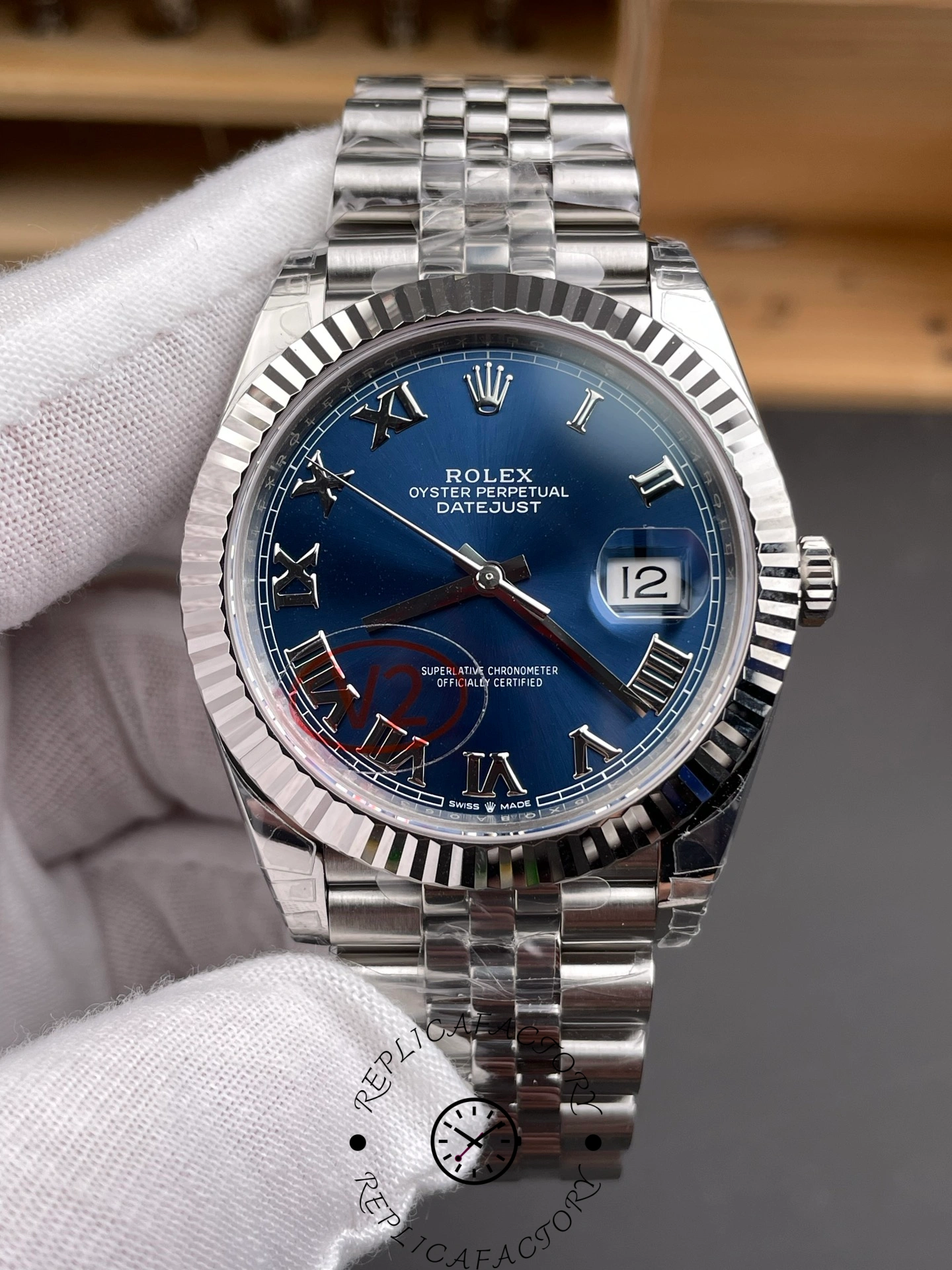 Close-up front view of THB Factory Rolex Datejust 41 ref. 126334-0026 showing detailed blue sunburst dial texture.
