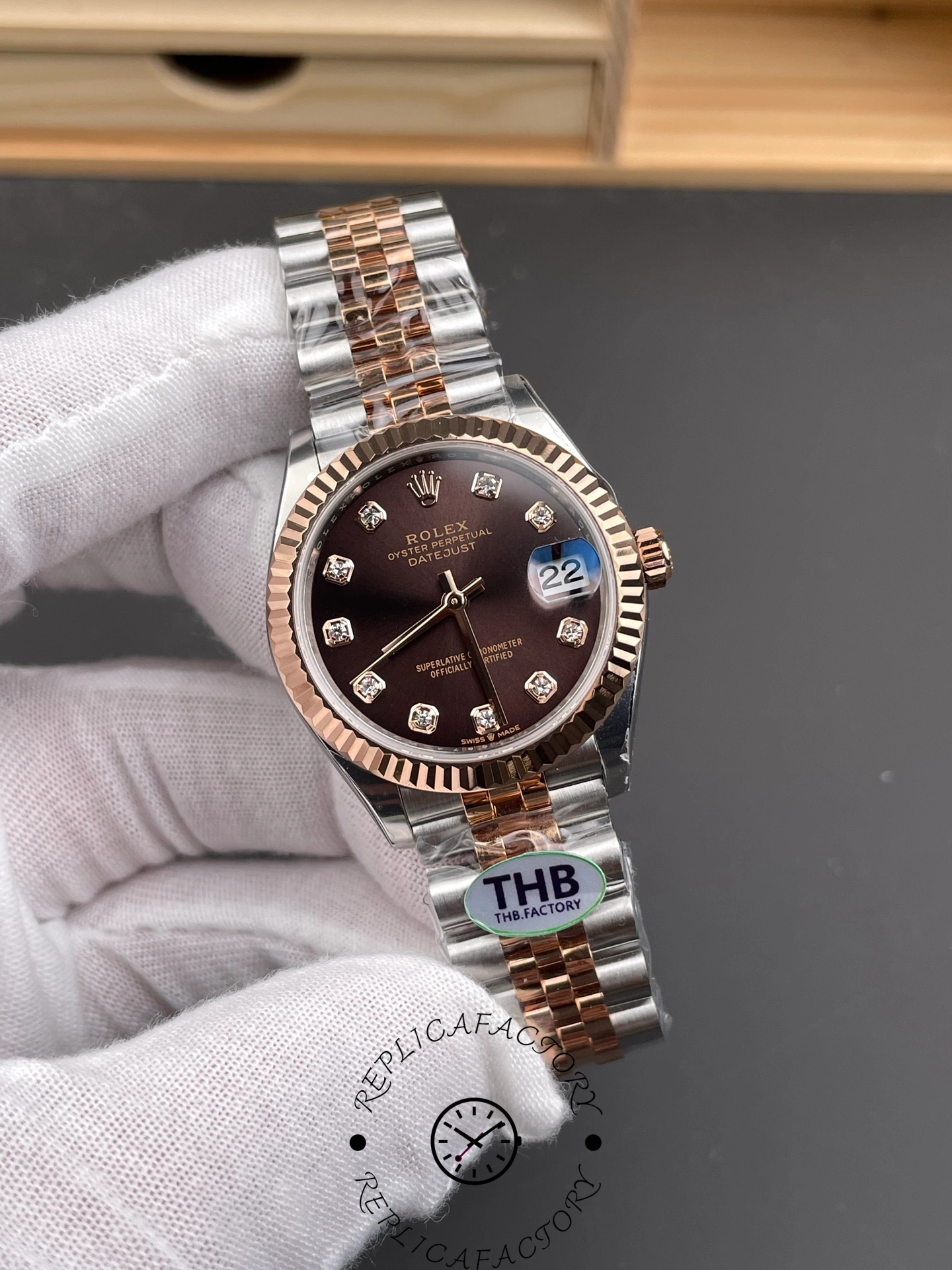 Angled front view of THB Factory Rolex Datejust 31 ref. 278271-0028 with diamond hour markers and Jubilee bracelet reflection.