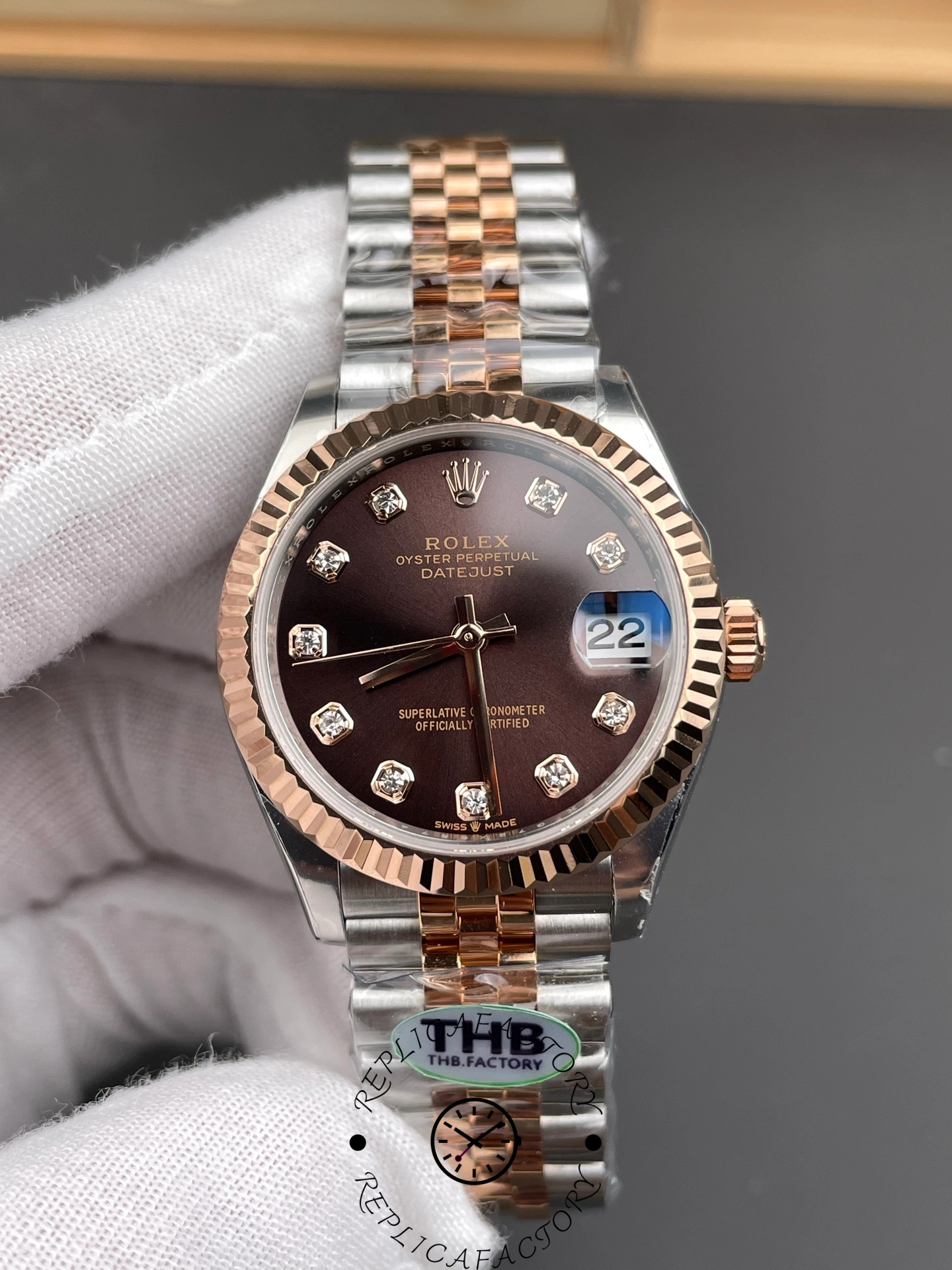 Close-up of THB Factory Rolex Datejust 31 ref. 278271-0028 highlighting sunburst texture and applied diamond indices.