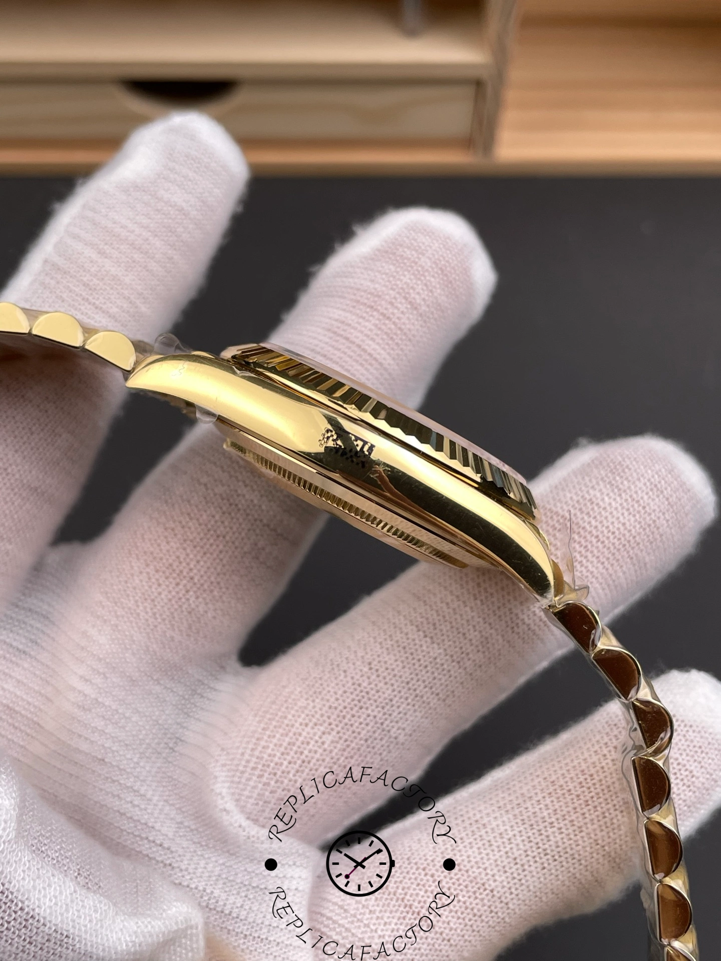 Opposite side view of Rolex Day-Date 228238 showing case profile and polished lugs.