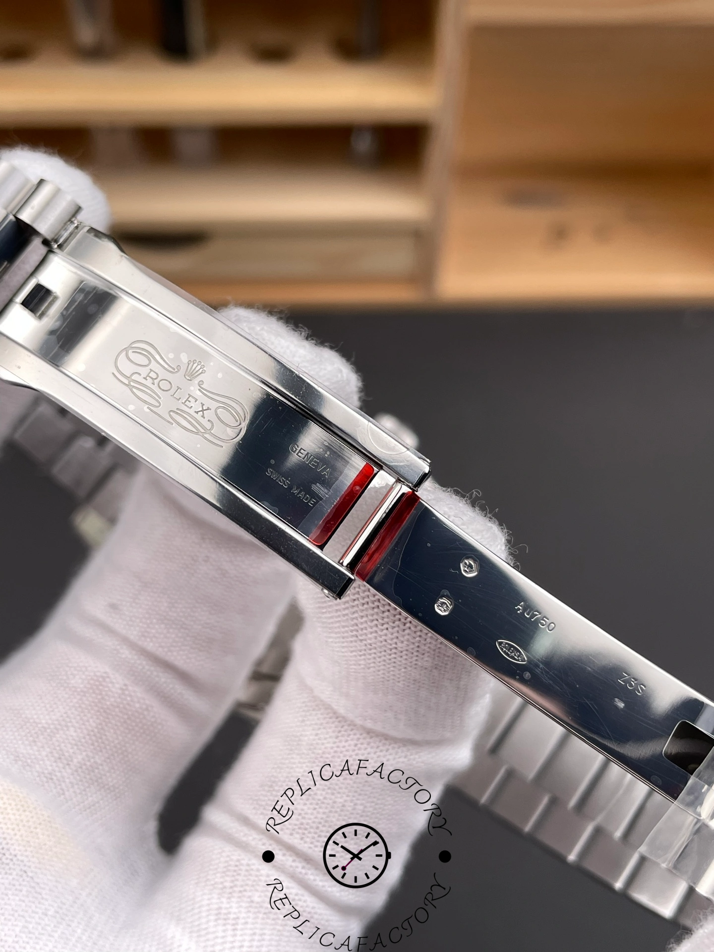 Inside clasp view of RC Factory Rolex Day-Date 228239 engraved with Rolex Geneva and Swiss Made markings.