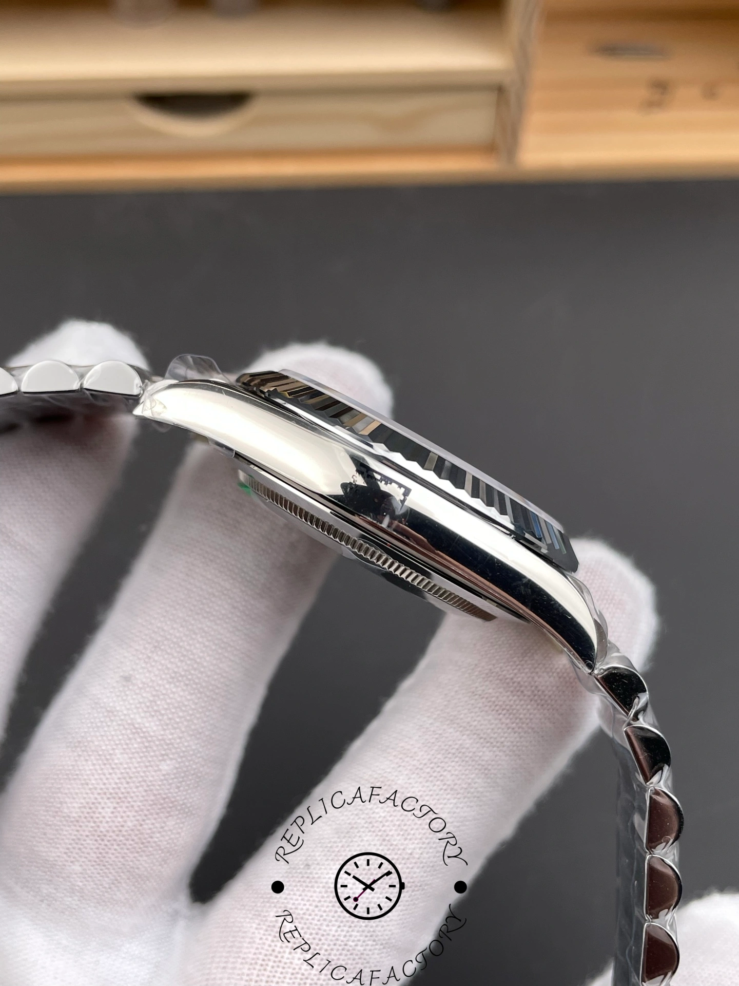 Opposite side view of RC Factory Rolex Day-Date 228239 showing case profile and bezel detail.