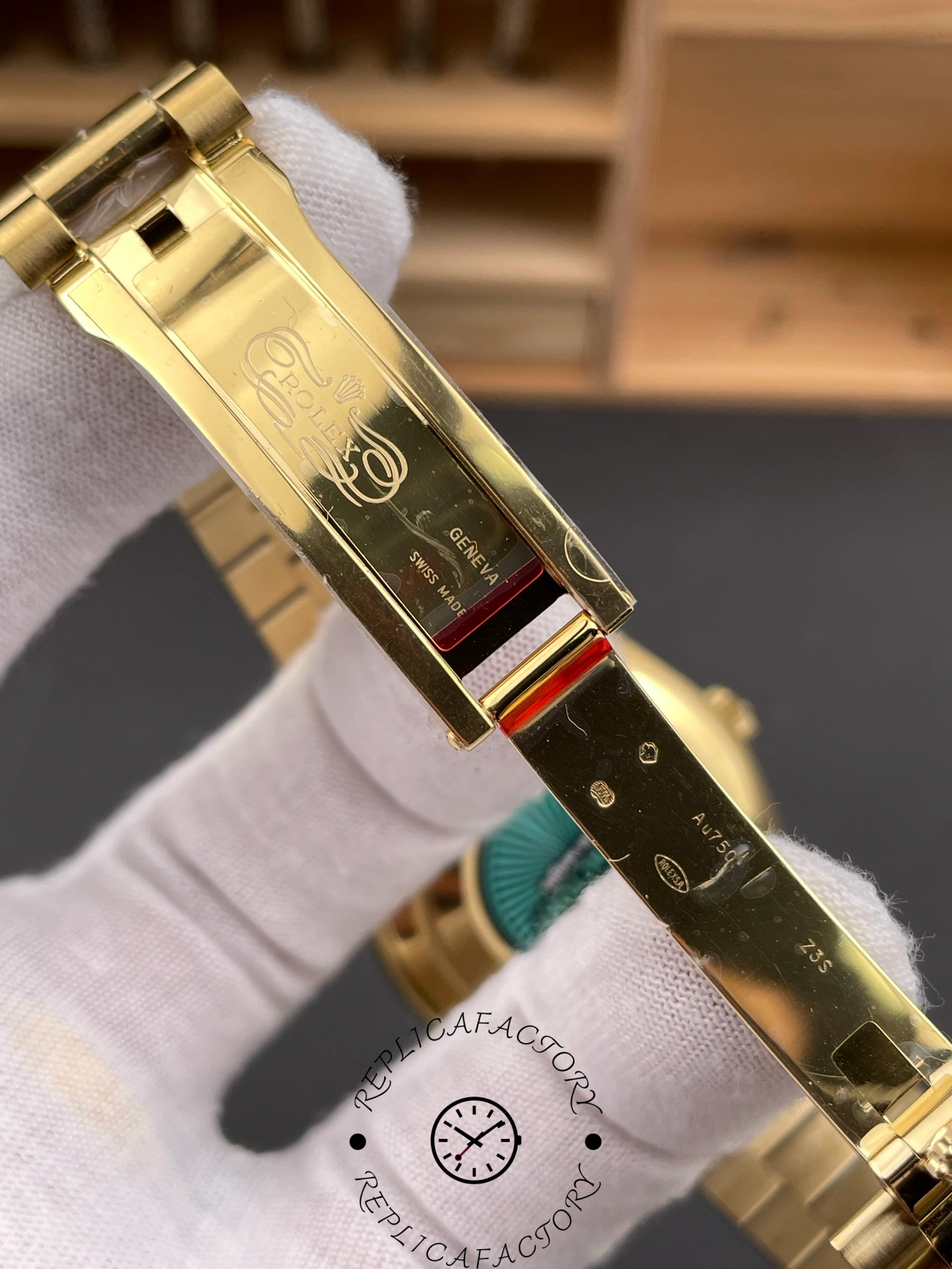 Inside clasp view of RC Factory Rolex Day-Date 228238 engraved with Rolex Geneva markings.