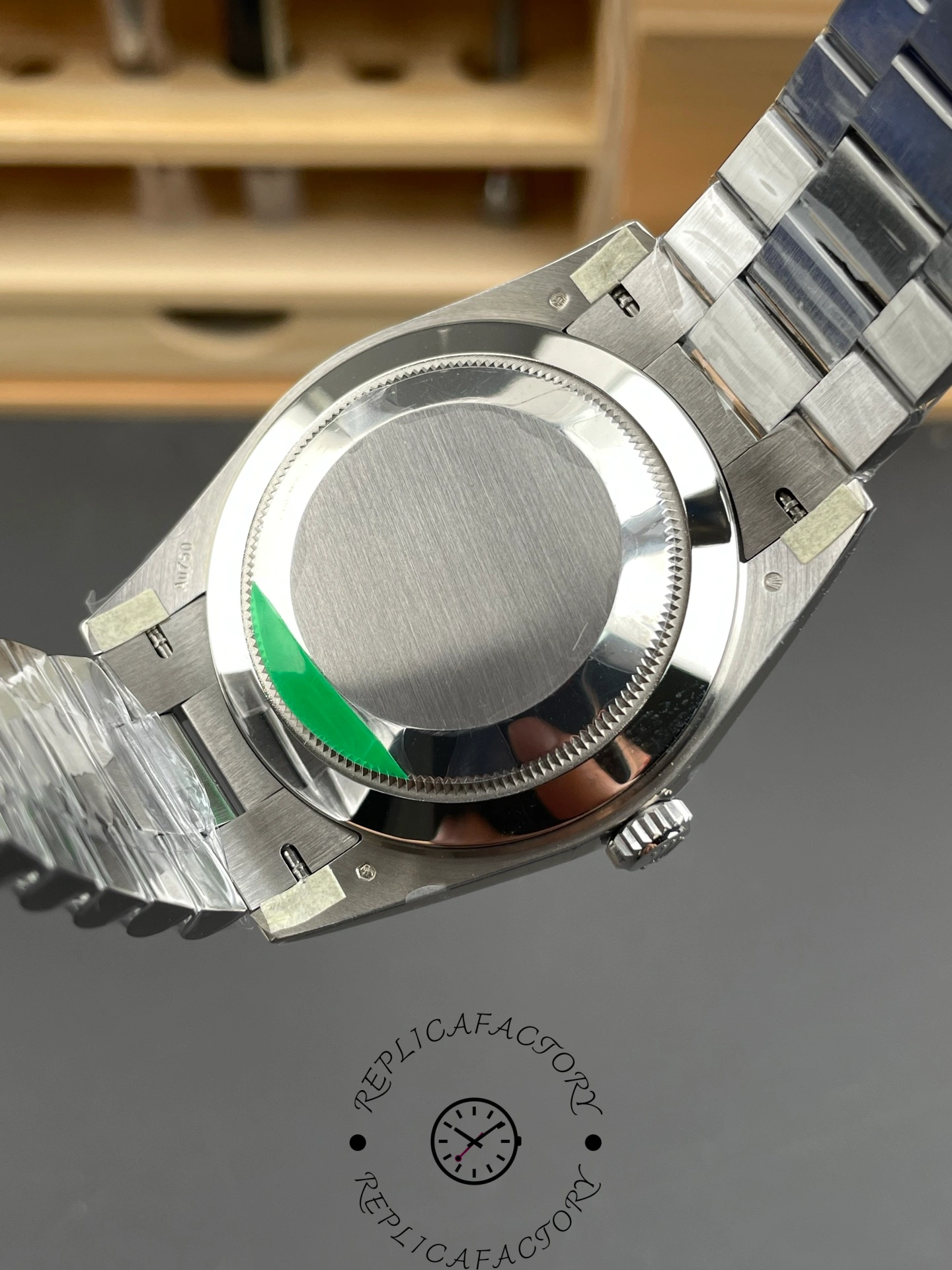 Caseback view of RC Factory Rolex Day-Date 228239 showing brushed steel back cover.