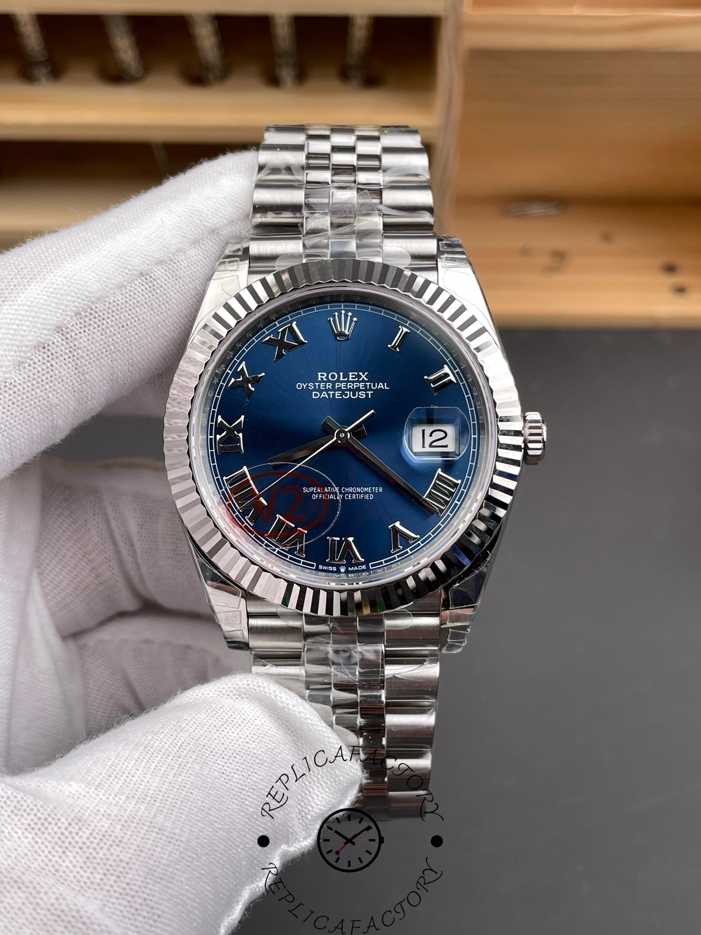 Front view of THB Factory Rolex Datejust 41 ref. 126334-0026 showing blue sunray dial and fluted bezel.