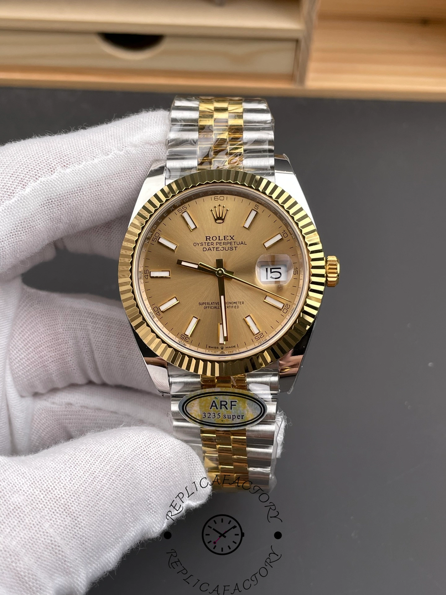 Front view of ARF Factory Rolex Datejust 41 ref. 126333-0010 showing champagne dial and fluted yellow gold bezel.