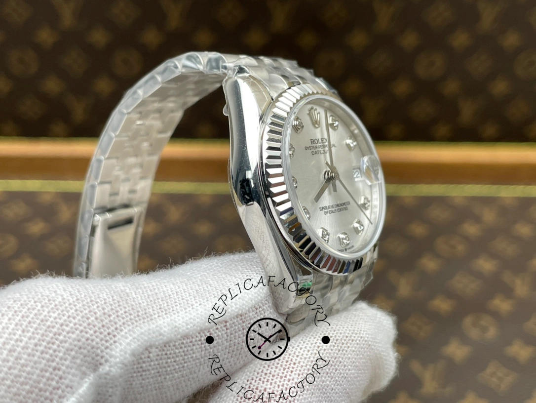 Side profile of ReplicaFactory Rolex Datejust m278274-0030 showing smooth case lines and fluted bezel.