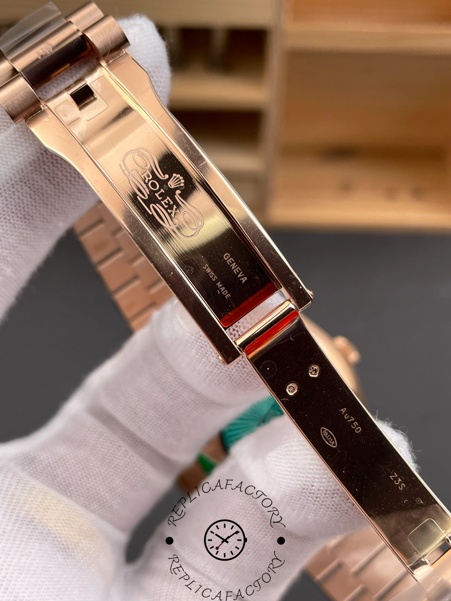 Inside clasp view of Rolex Day-Date 228235 engraved with Rolex Geneva markings.