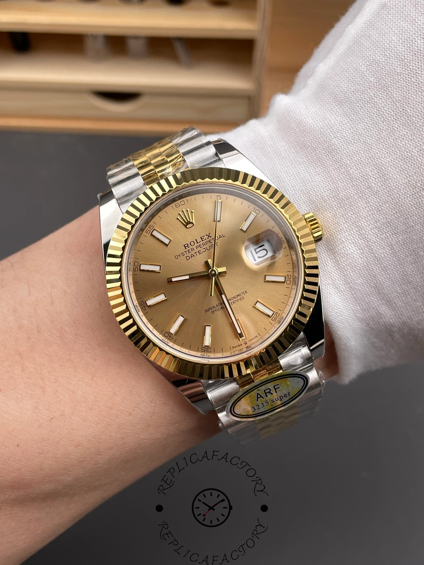 Wrist shot of ARF Factory Rolex Datejust 41 ref. 126333-0010 showing champagne dial under indoor light.