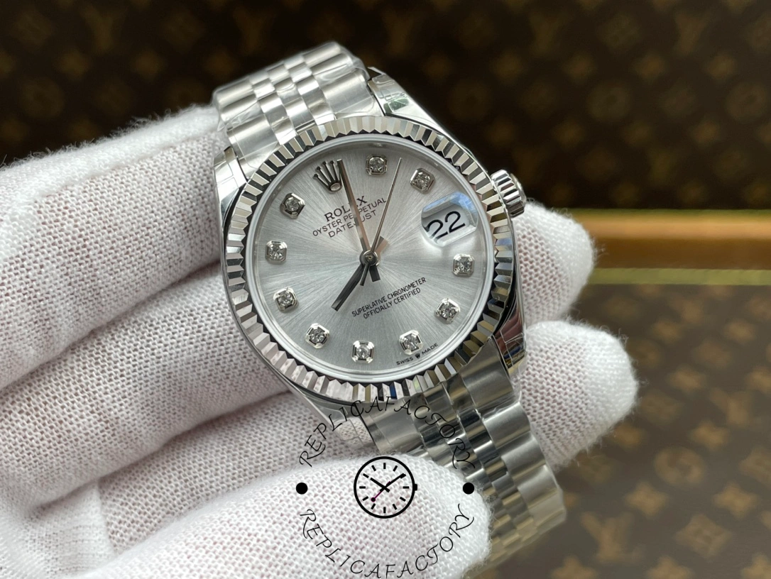 Angled front shot of ReplicaFactory Rolex Datejust m278274-0030 highlighting the Jubilee bracelet and polished lugs.