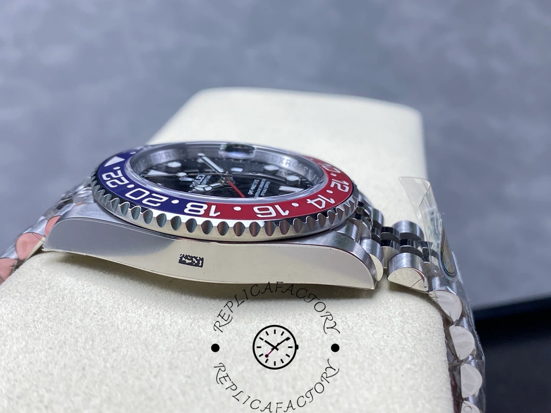 Side profile of Rolex GMT-Master II 126710BLRO showing brushed steel case and curved lugs.